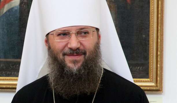 священник